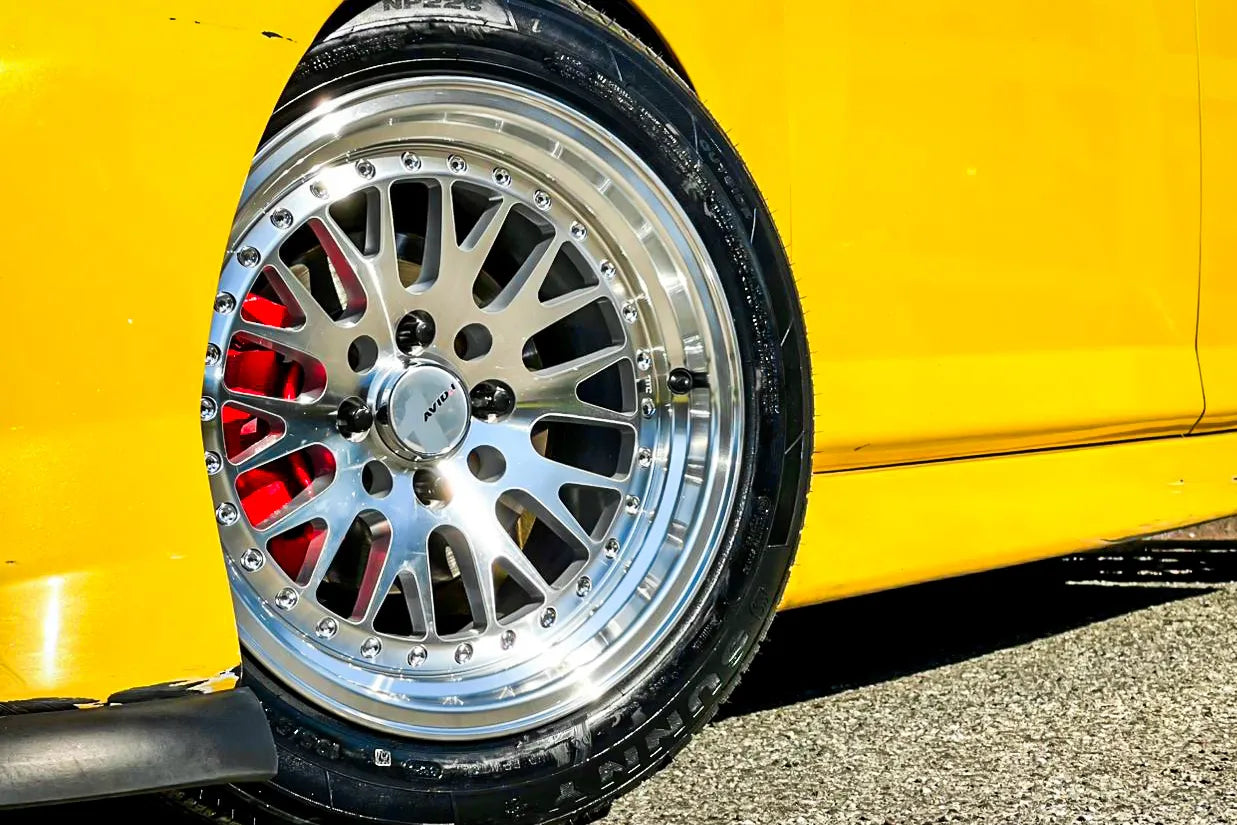 Original Rhino photo of a yellow Honda Jazz with machined alloy wheels