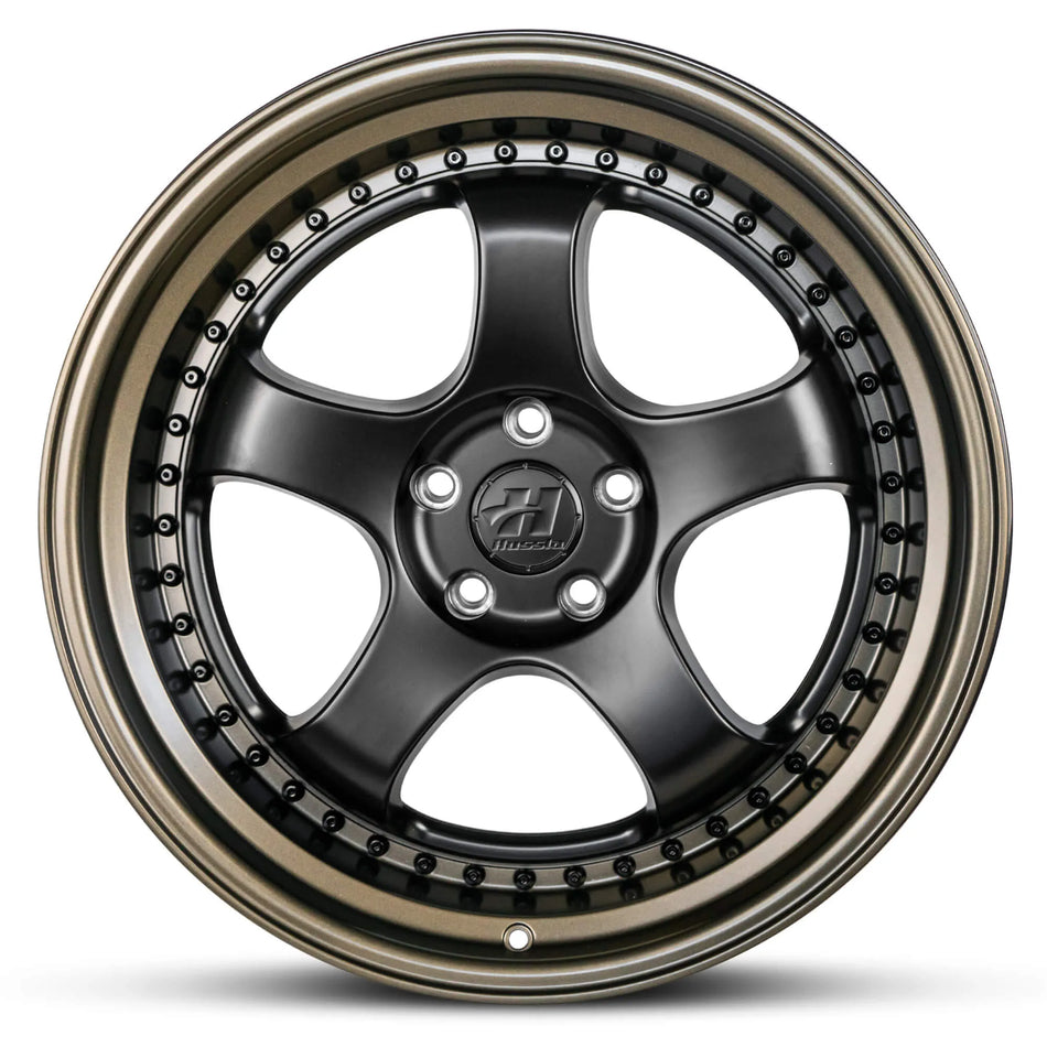 HUSSLA ZEN 19X8.5 adjustable 15 MATTE BLACK CENTRE MATTE BRONZE LIP AND BLACK RIVETS